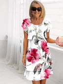 Éliane – Elegant Flowing Dress with Flounces